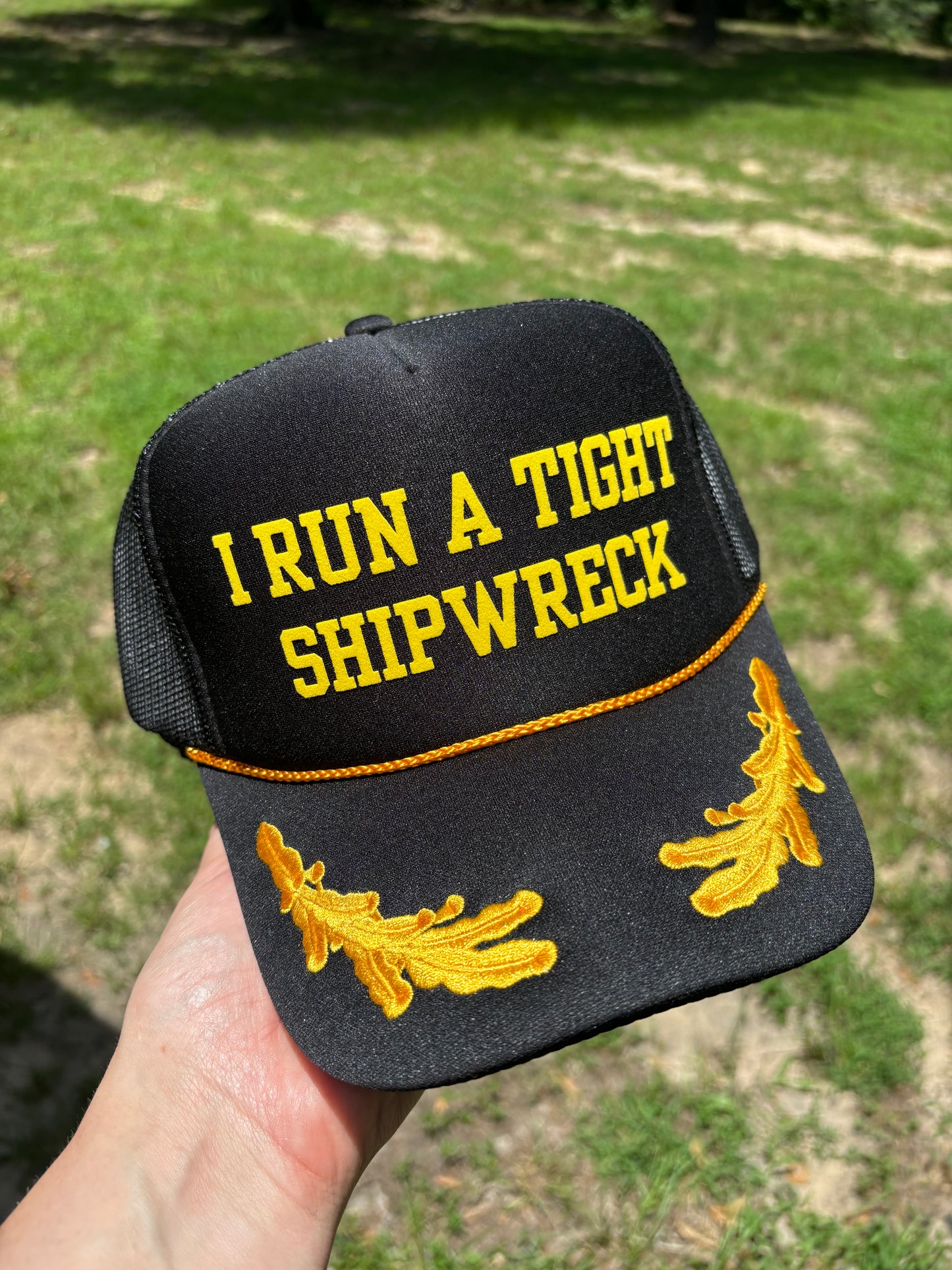 I Run a Tight Shipwreck Trucker Hat